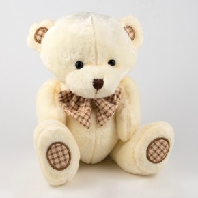 Игрушка м/н Медведь с бантом, 25см, крем. в интернет-магазине флористических аксессуаров Азалия Декор