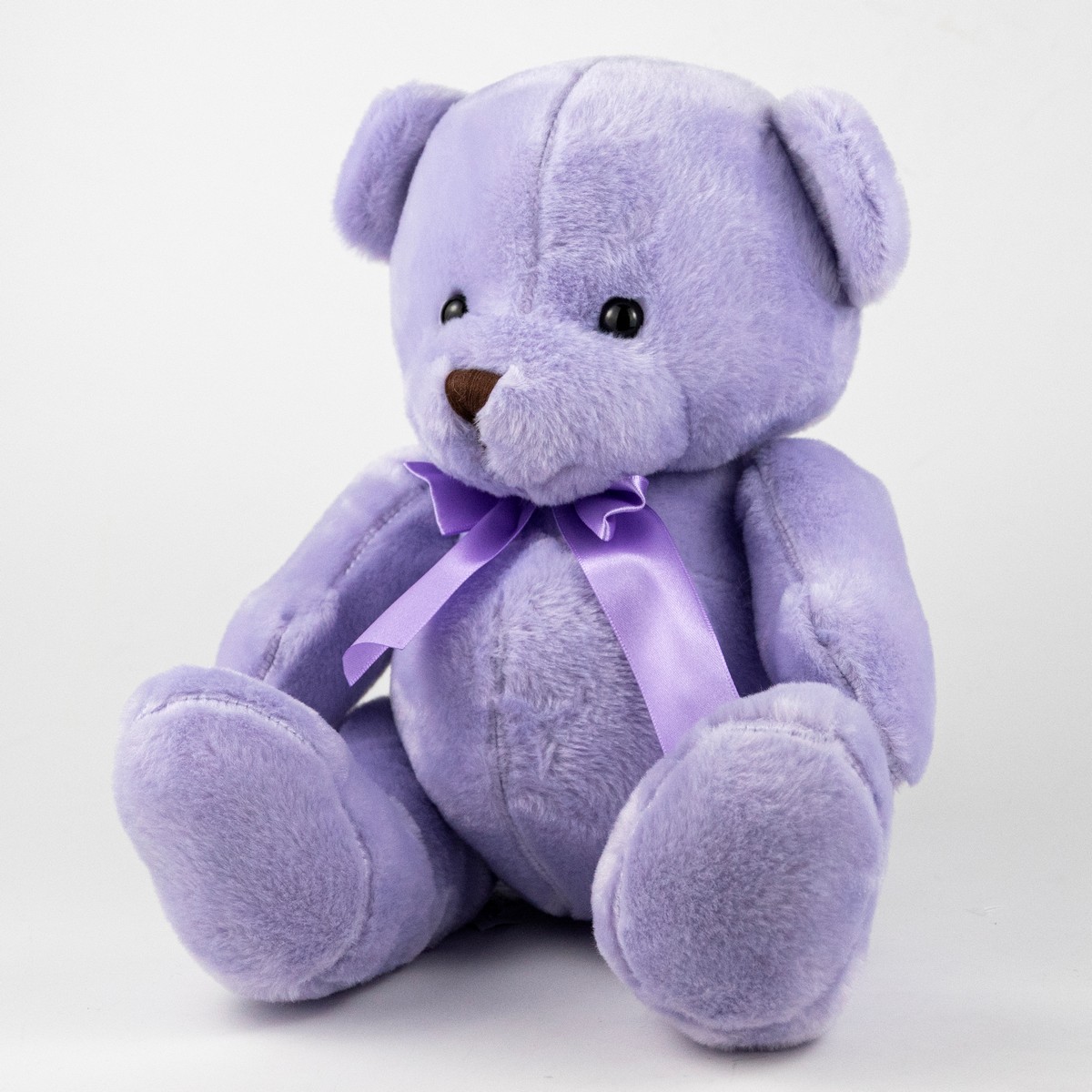 Игрушка м/н Медведь с бантом, 25см, светл.-сирен. в интернет-магазине флористических аксессуаров Азалия Декор