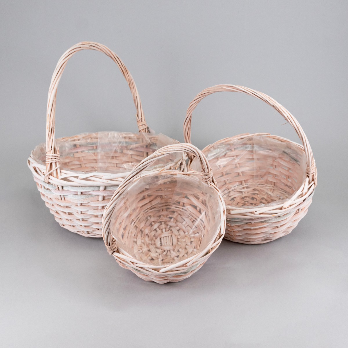 Набор корзин плетеных 3шт. (ива), D32x15xH35см, отбеленый/розовый/зеленый в интернет-магазине флористических аксессуаров Азалия Декор
