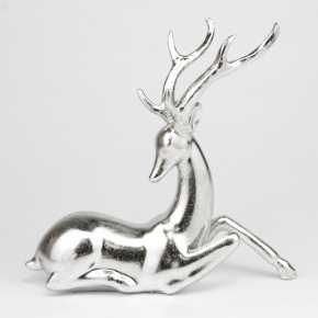 Сувенир Олень лежащий (полирезин), Н20,5х21х7,5см, серебряный в интернет-магазине флористических аксессуаров Азалия Декор
